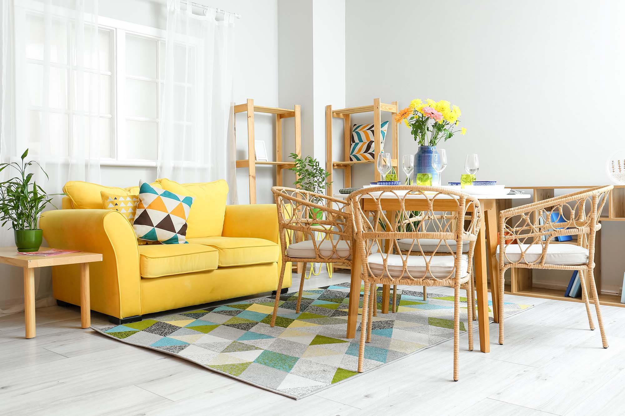 yellow couch on a patterned area rug from The Carpet Store in Oklahoma City, OK